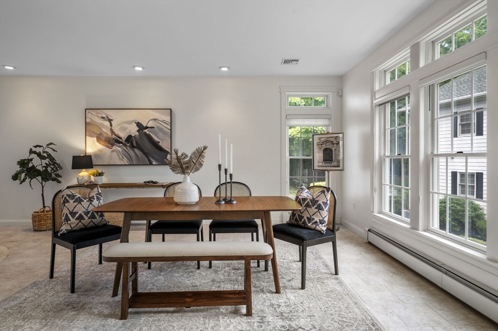 209 Maple Street Danvers, MA 01923 - Photo 11 of 42 a view of a workspace with furniture and window