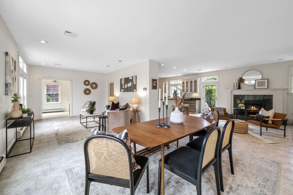 209 Maple Street Danvers, MA 01923 - Photo 12 of 42 a dining room with furniture and wooden floor