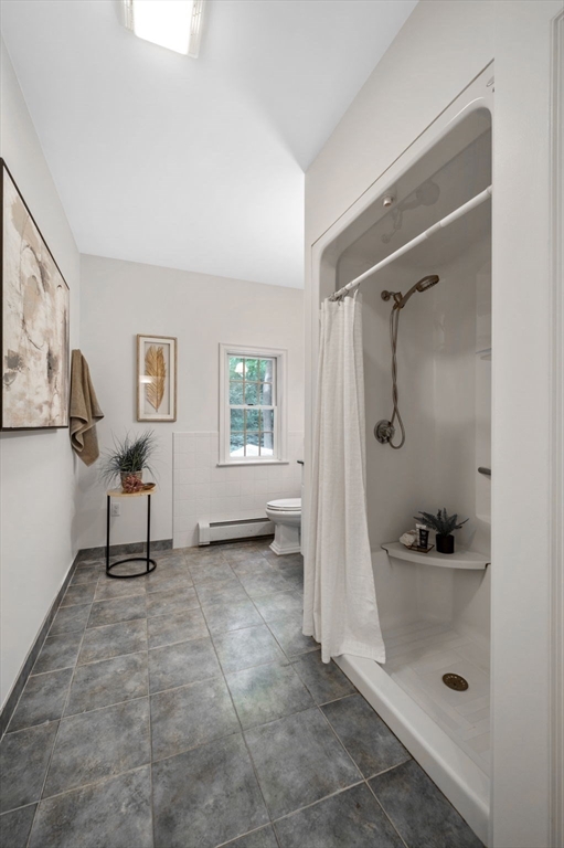 209 Maple Street Danvers, MA 01923 - Photo 32 of 42 a bathroom with a shower and a sink