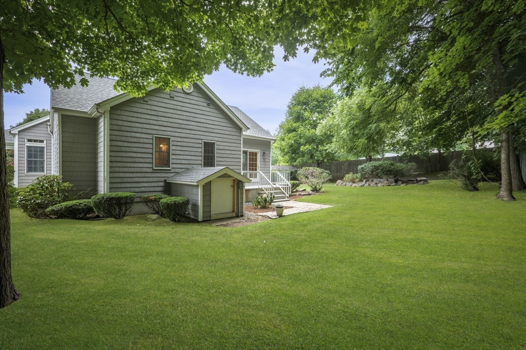 209 Maple Street Danvers, MA 01923 - Photo 38 of 42 a view of a house with backyard