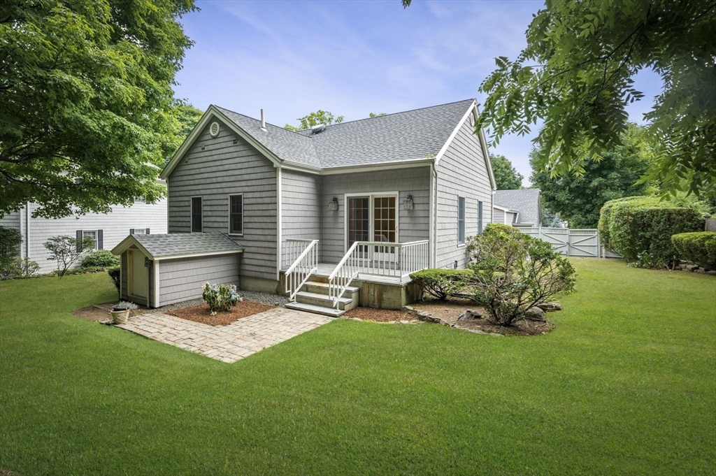 209 Maple Street Danvers, MA 01923 - Photo 42 of 42 a view of a house with backyard and sitting area
