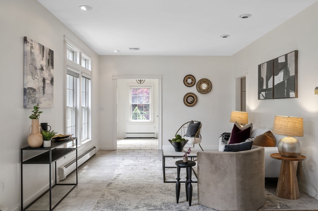209 Maple Street Danvers, MA 01923 - Photo 10 of 42 a living room with furniture and window