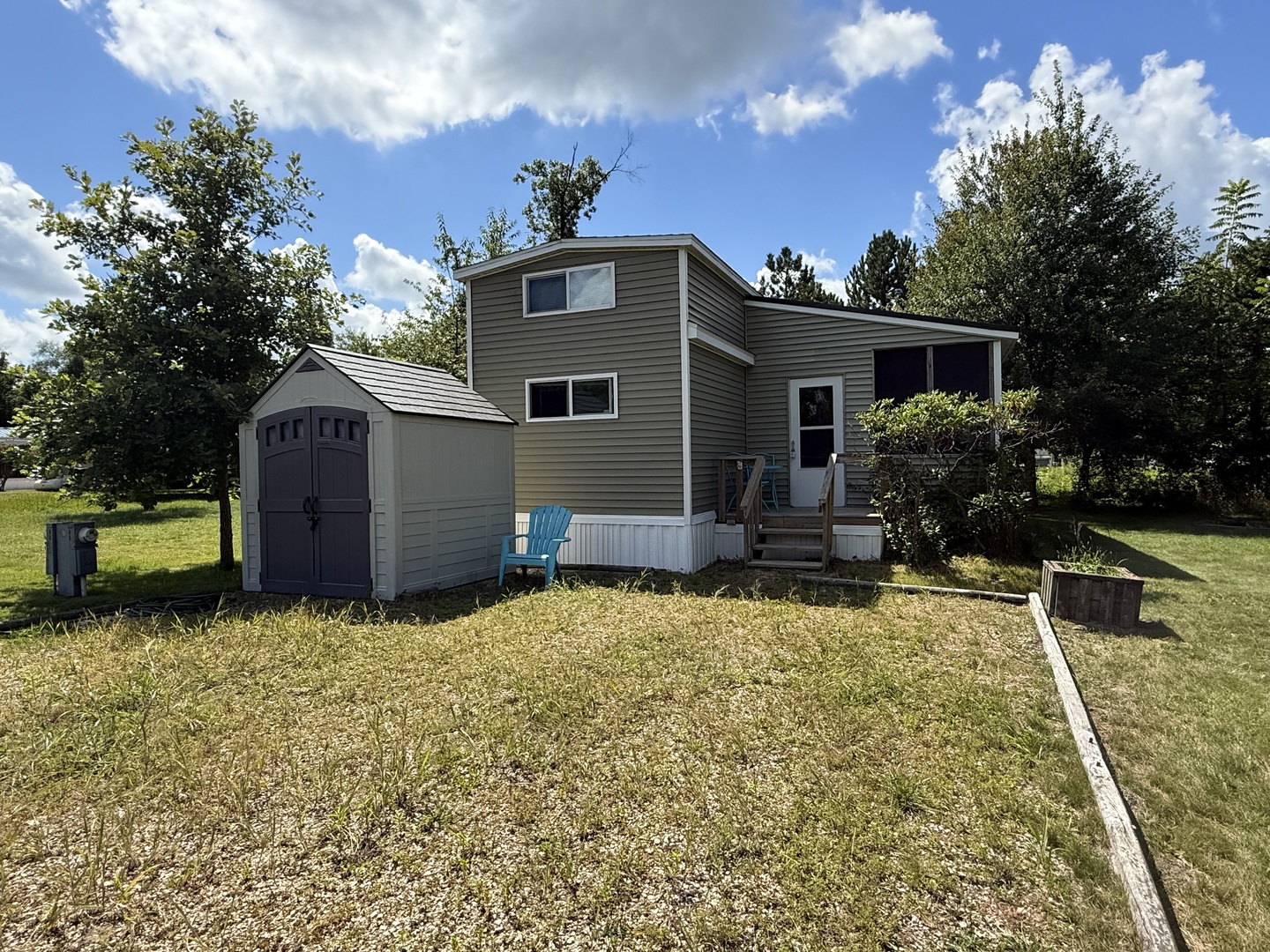 a house view with a garden space