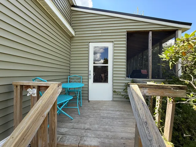 a balcony with furniture
