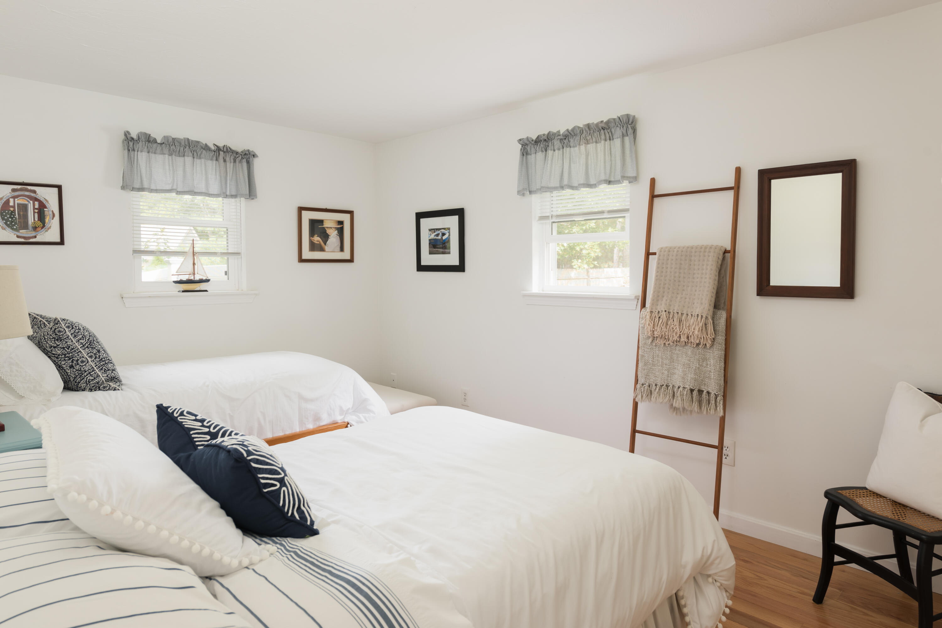 268 Bumps River Road Osterville, MA 02655 - Photo 12 of 33 a bedroom with a bed and a window