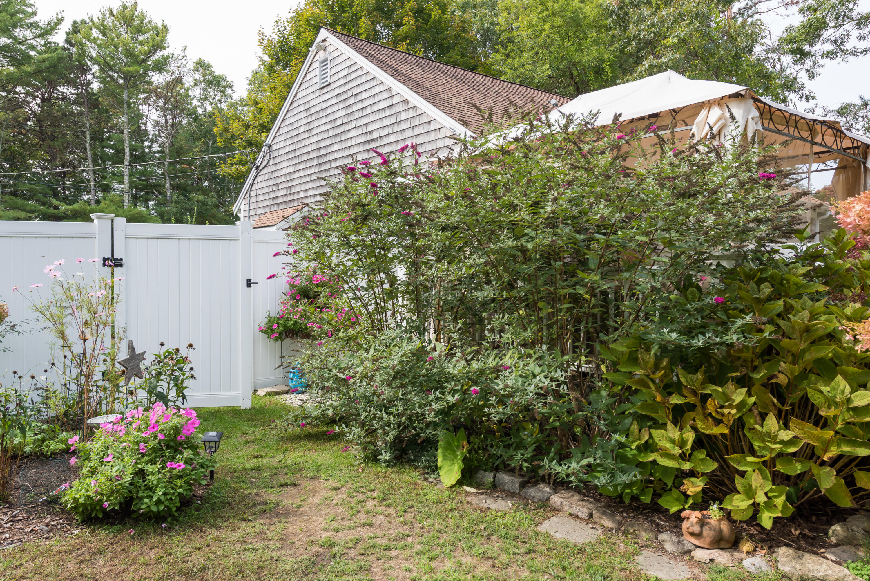 268 Bumps River Road Osterville, MA 02655 - Photo 20 of 33 a view of a backyard