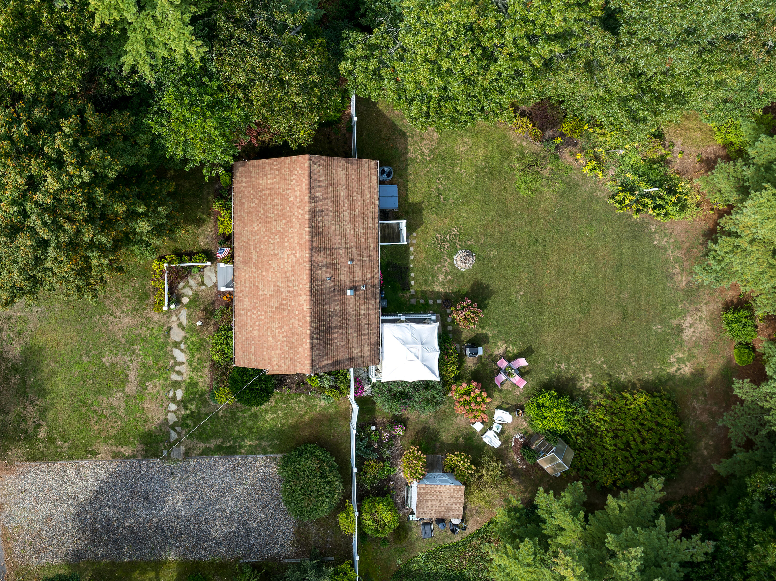 268 Bumps River Road Osterville, MA 02655 - Photo 30 of 33 a backyard of a house with lots of green space