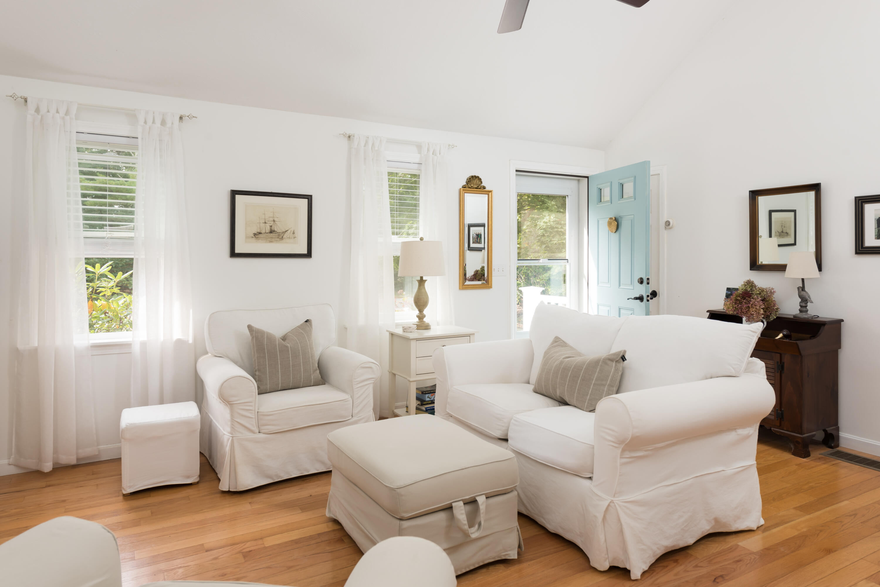 268 Bumps River Road Osterville, MA 02655 - Photo 5 of 33 a living room with furniture and a large window