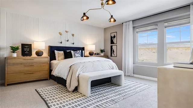 a bed room with a bed and a window