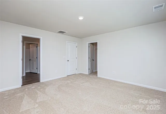 a bathroom with a double vanity sink and mirror