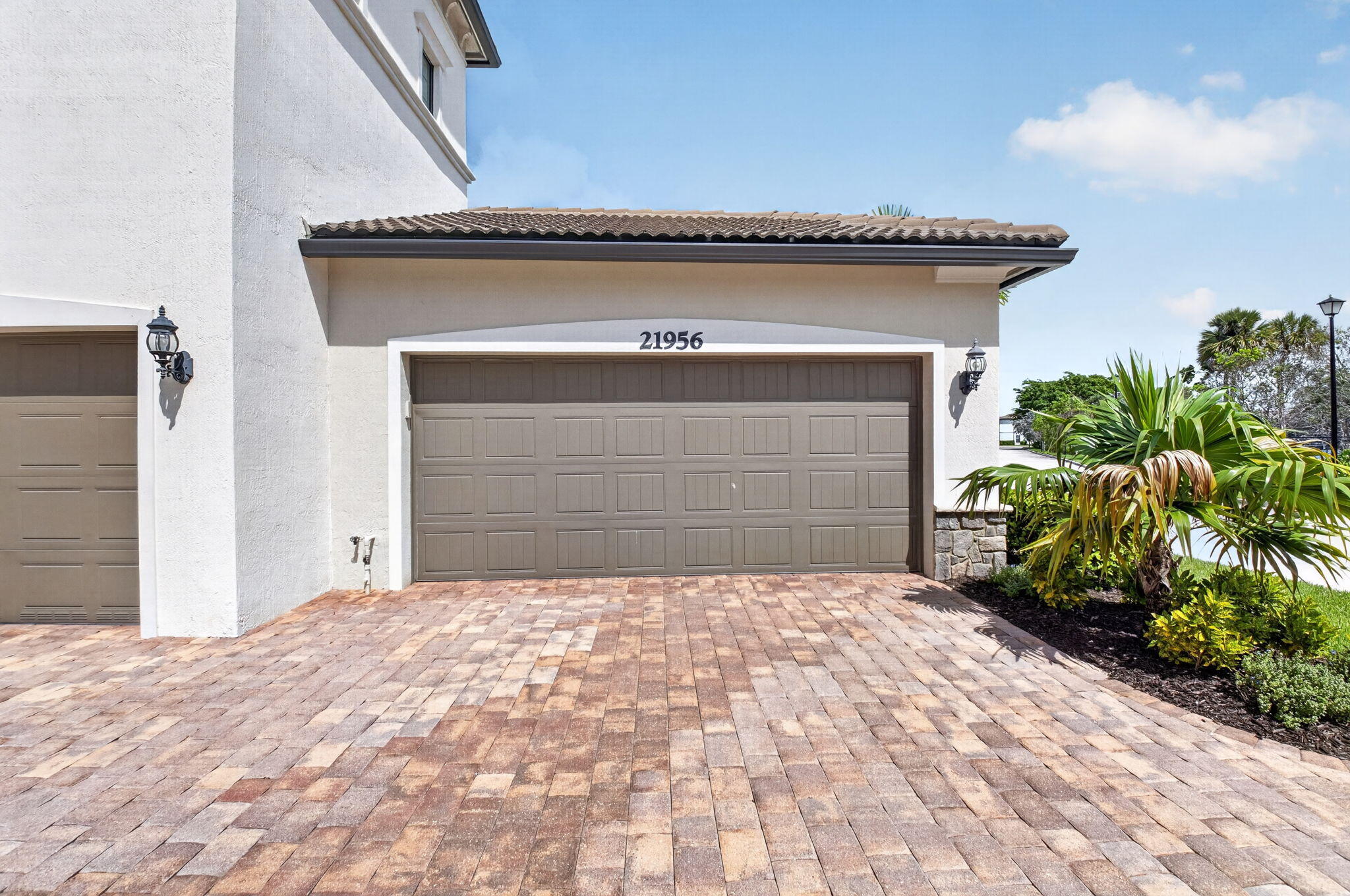 21956 Canadensis Circle, Unit 201 Boca Raton, FL 33428 - Photo 36 of 37 Two Car Garage