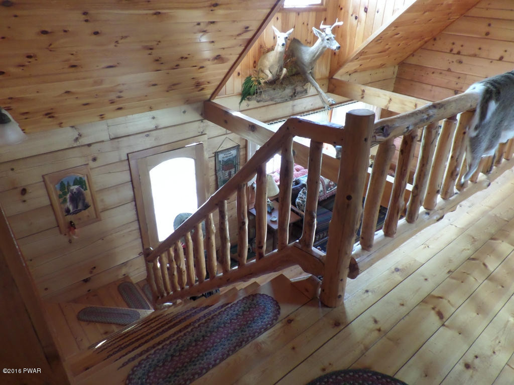 136 Sawmill Road Greentown, PA 18426 - Photo 18 of 40 Hand Carved Railings