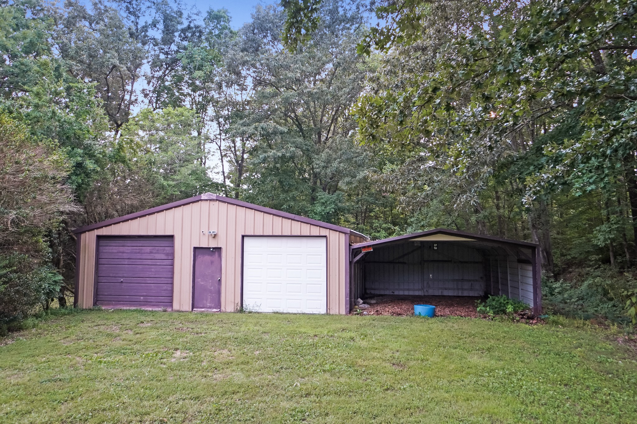 2840 South Main Street Tennessee Ridge, TN 37178 - Photo 18 of 44 a view of a barn with a yard