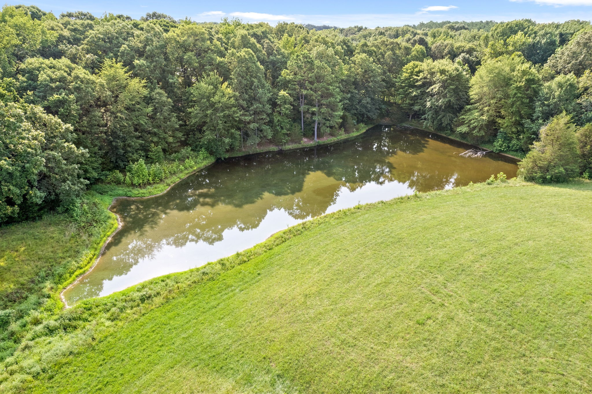 2840 South Main Street Tennessee Ridge, TN 37178 - Photo 3 of 44 a view of a lake with a yard