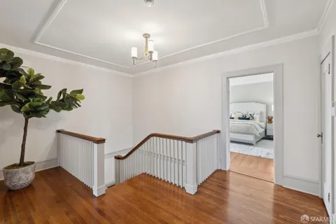 a kitchen with stainless steel appliances granite countertop a sink and a wooden cabinets