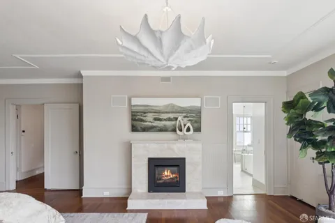 a bedroom with a bed and a cabinets