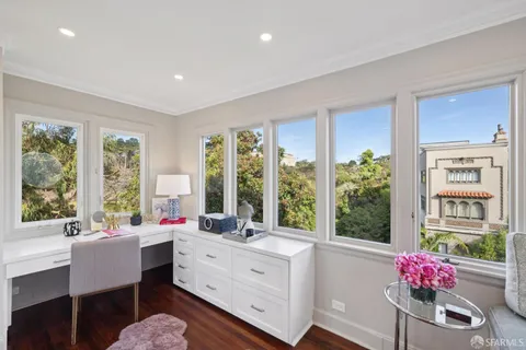 a bathroom with a bathtub and a sink