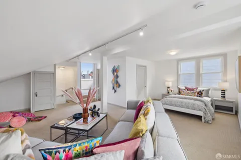 a utility room with sink dryer and washer