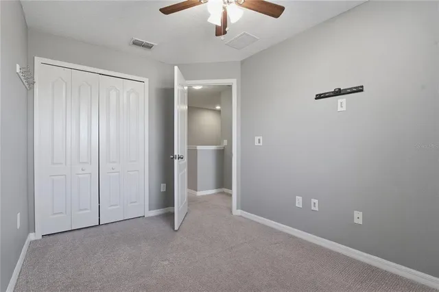 an empty room with a bathroom