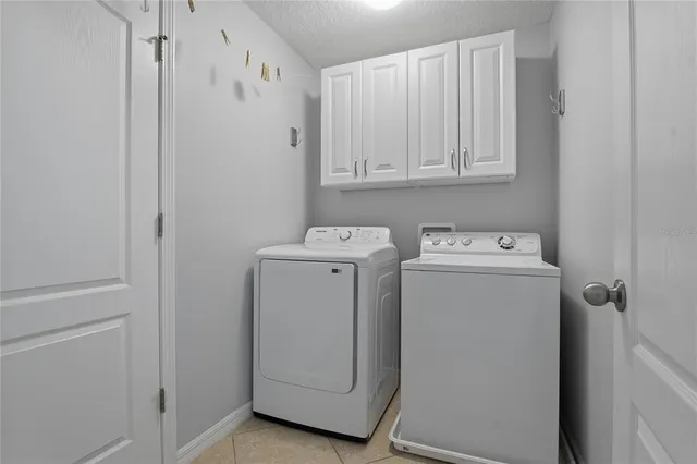 a view of a livingroom with a ceiling fan and window