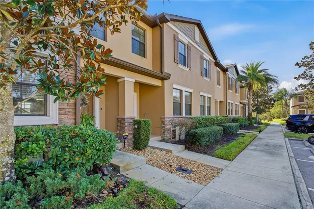 a view of a building with a yard