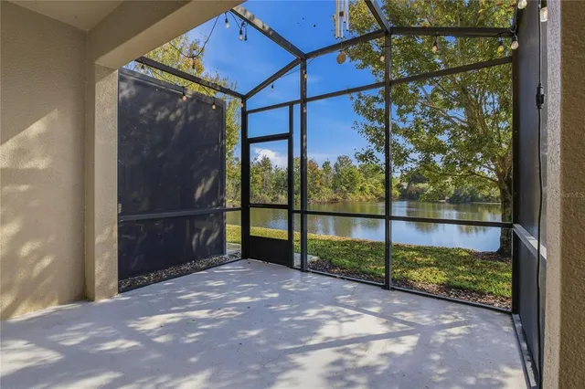 an aerial view of a swimming pool with garden
