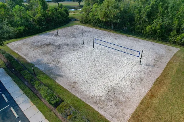 a view of swimming pool with a patio