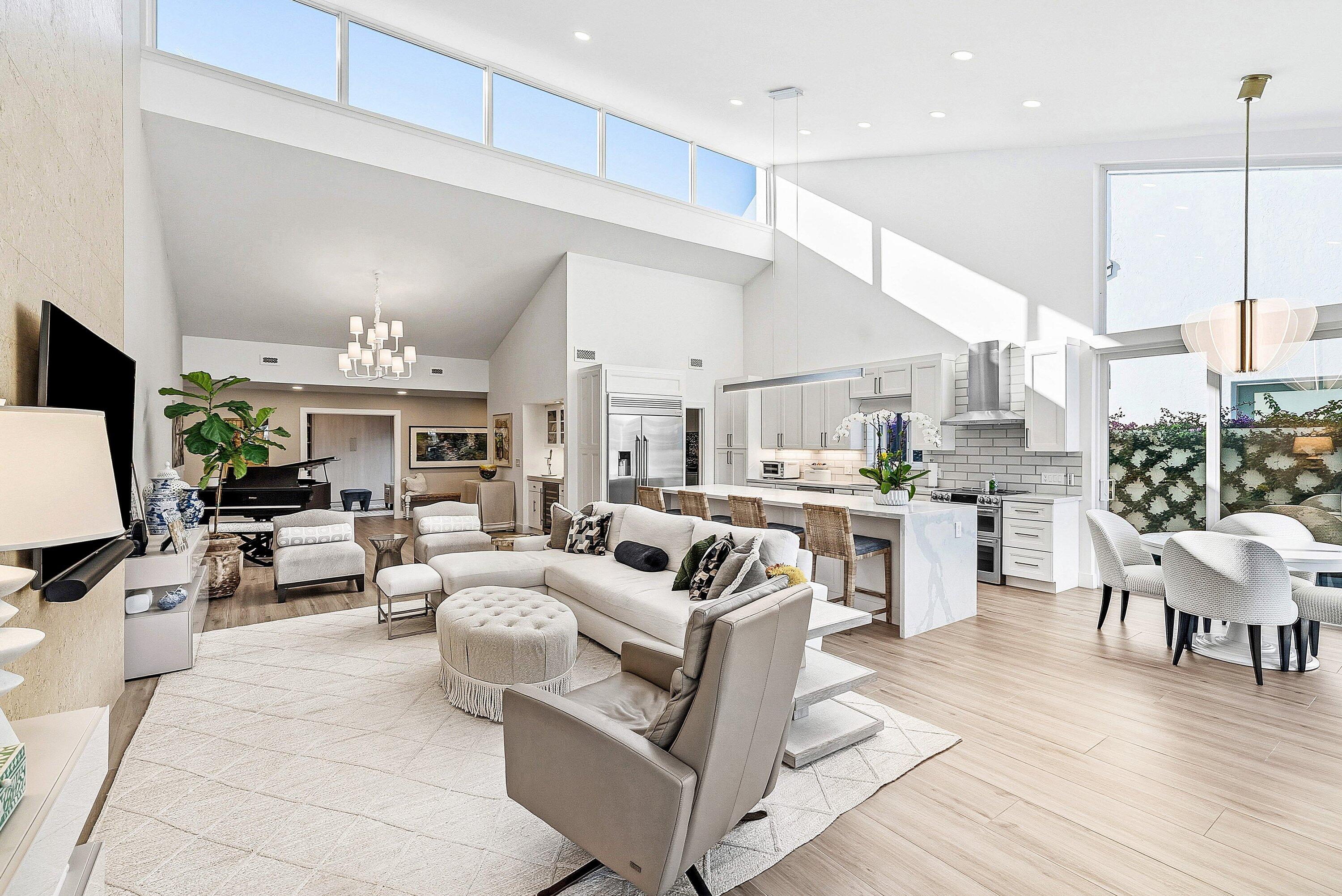 6110 North Ocean Boulevard, Unit 32 Ocean Ridge, FL 33435 - Photo 17 of 39 a living room with fireplace furniture and a wooden floor