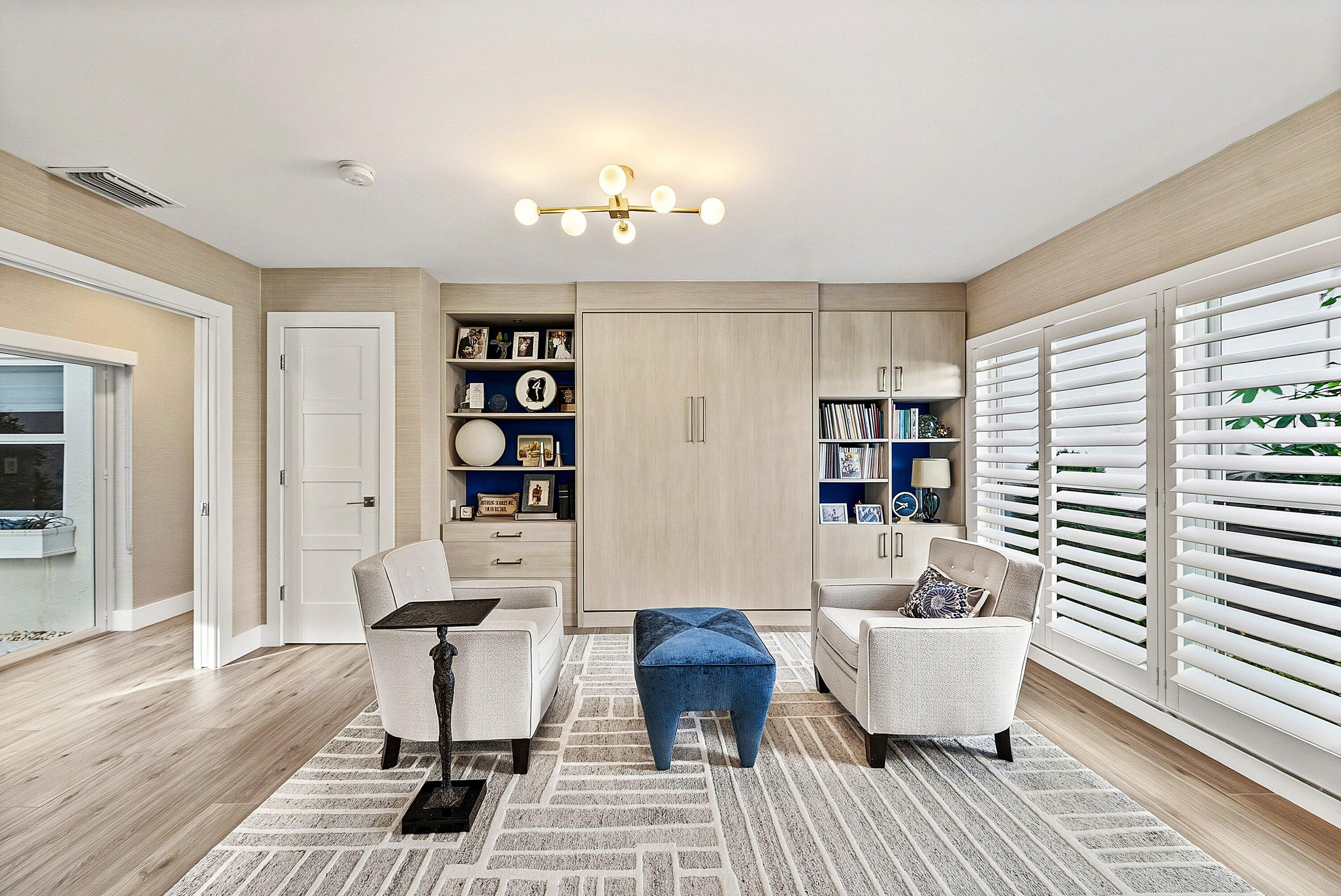 6110 North Ocean Boulevard, Unit 32 Ocean Ridge, FL 33435 - Photo 20 of 39 a living room with furniture and a table