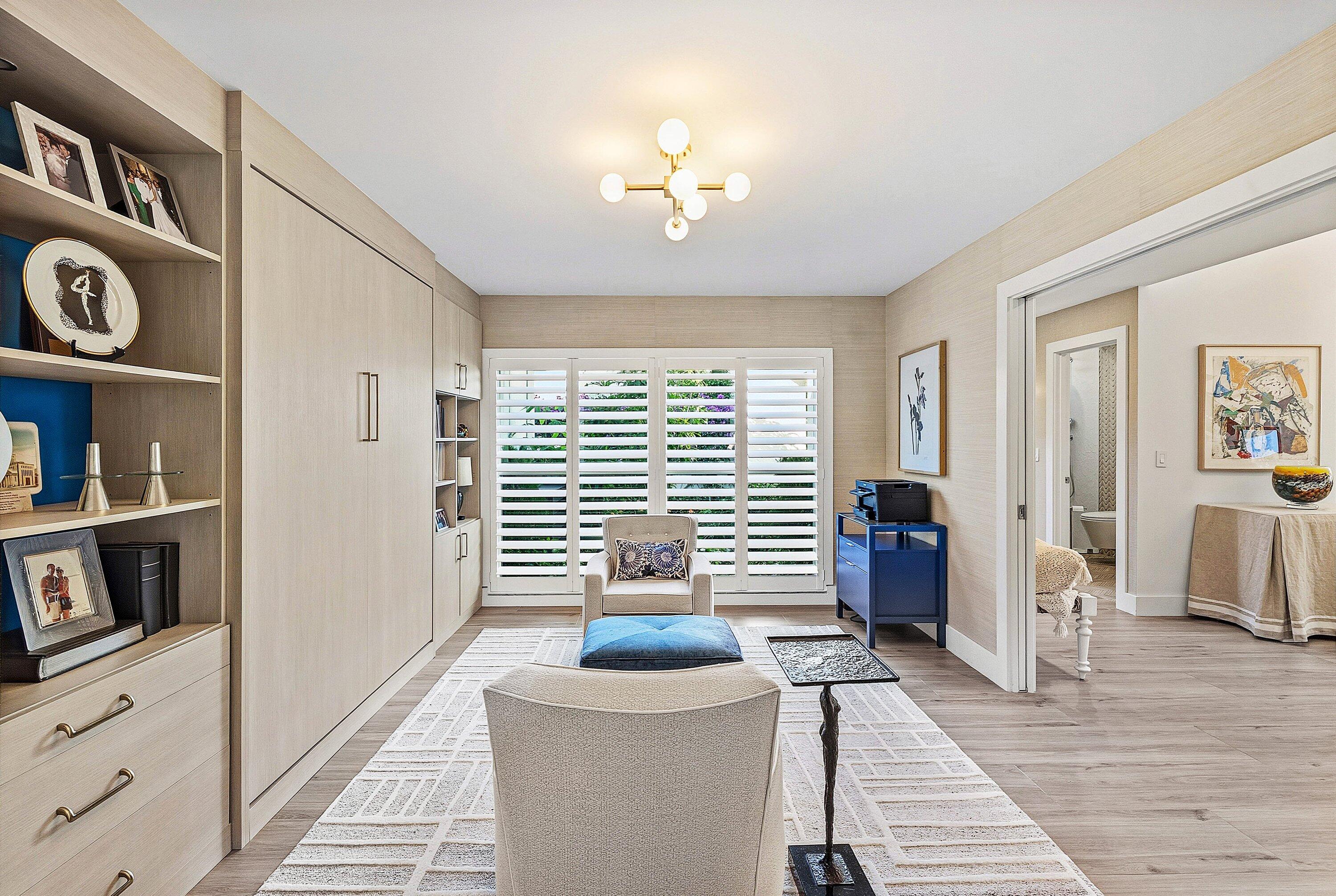 6110 North Ocean Boulevard, Unit 32 Ocean Ridge, FL 33435 - Photo 21 of 39 a living room with furniture and a window
