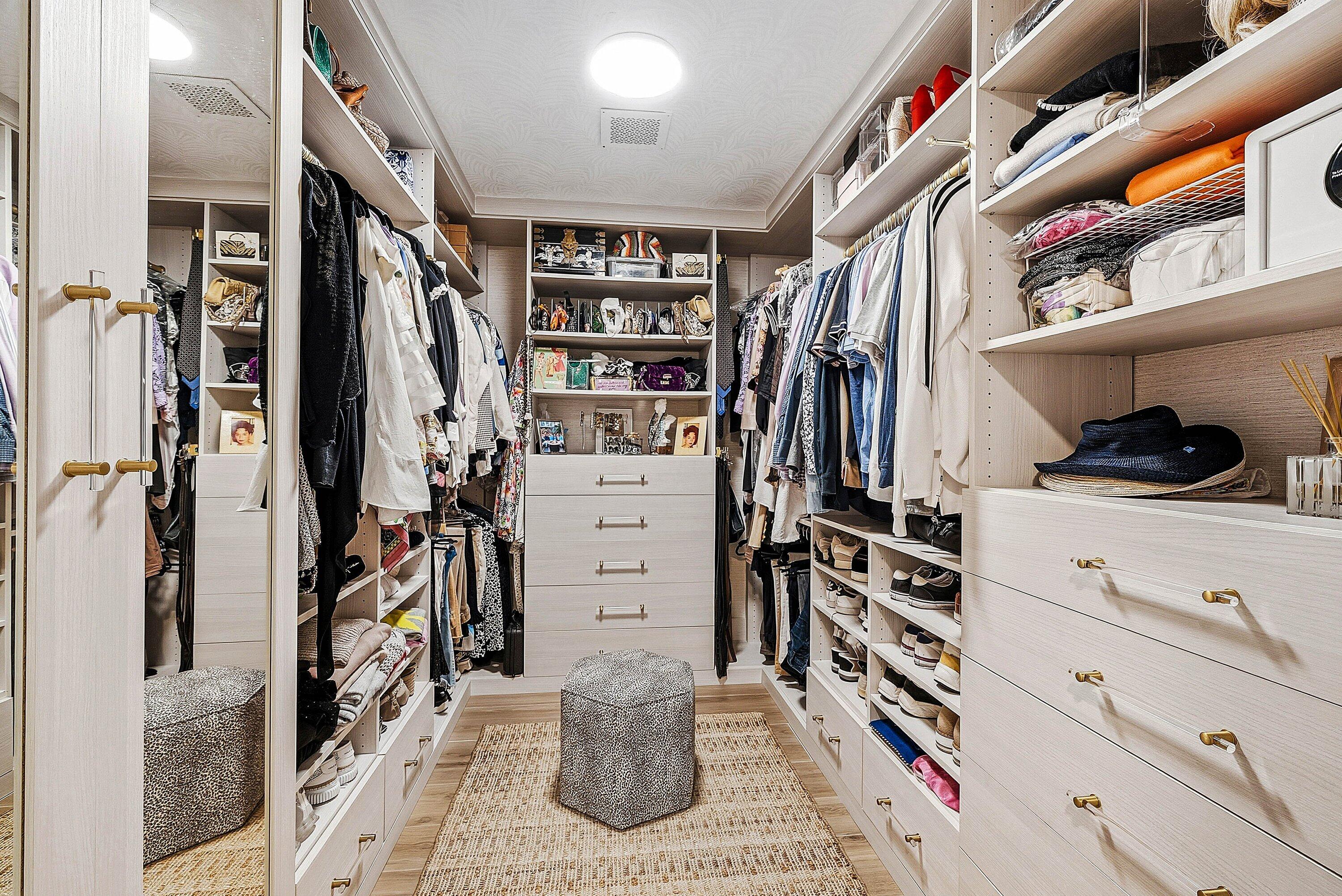 6110 North Ocean Boulevard, Unit 32 Ocean Ridge, FL 33435 - Photo 26 of 39 a view of walk in closet with clothes and shoes