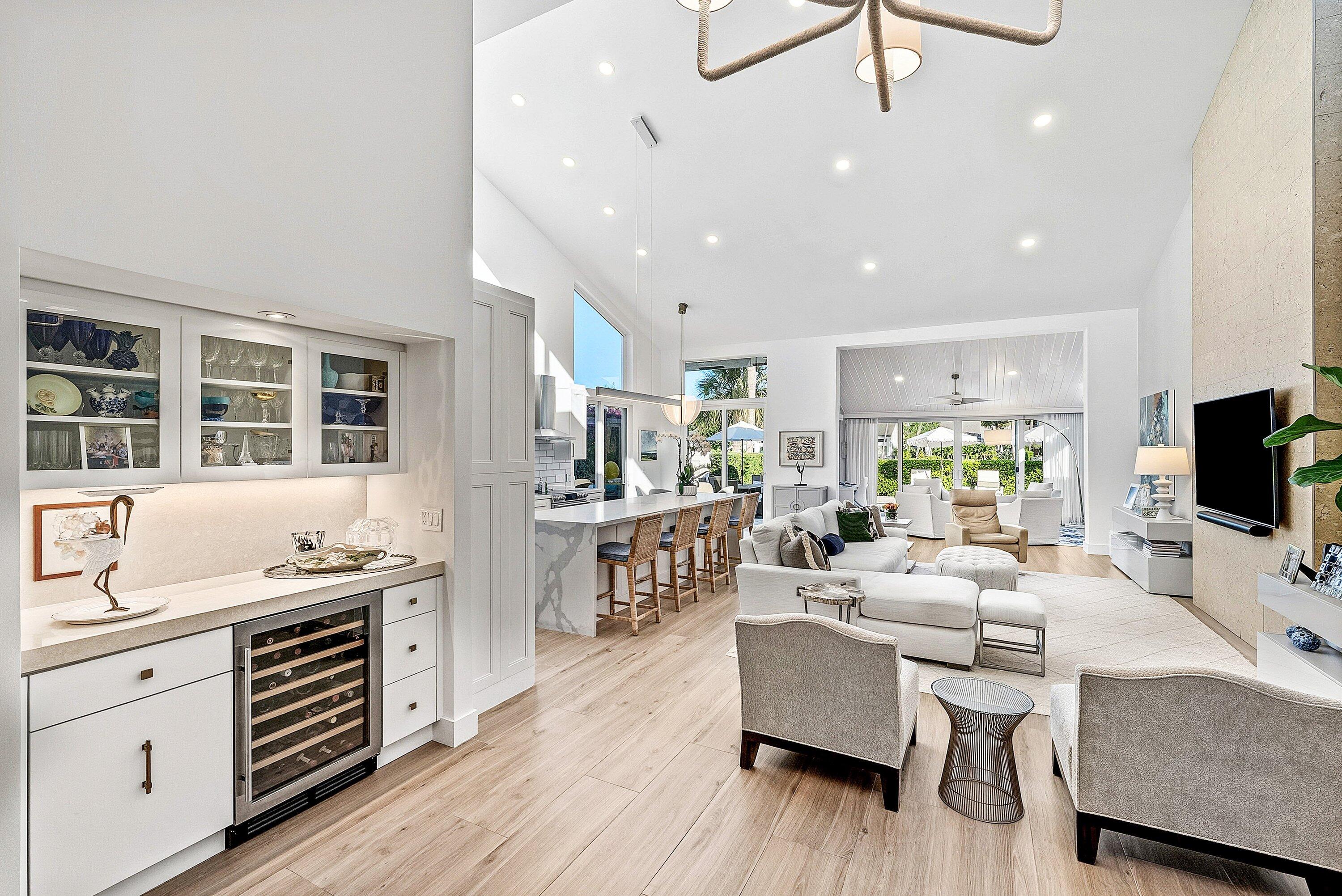 6110 North Ocean Boulevard, Unit 32 Ocean Ridge, FL 33435 - Photo 8 of 39 a living room with furniture and a flat screen tv