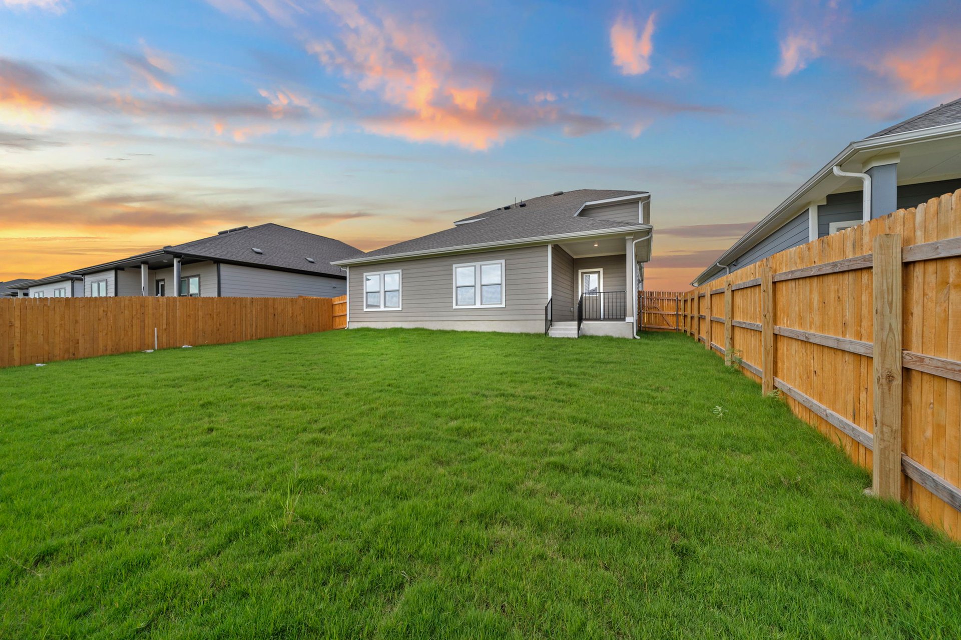 172 Wind Hill Jarrell, TX 76537 - Photo 28 of 30 Rear of Home and Private Backyard