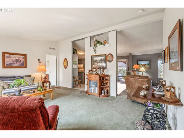 a living room filled with furniture and a couch