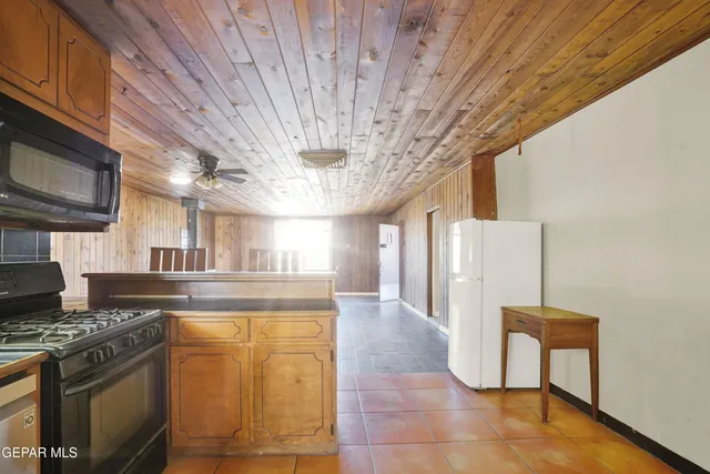a view of a livingroom with wooden floor