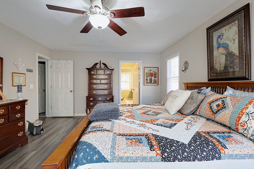 1236 Martin Road Hamilton, GA 31811 - Photo 12 of 33 a bedroom with a bed and wooden floor