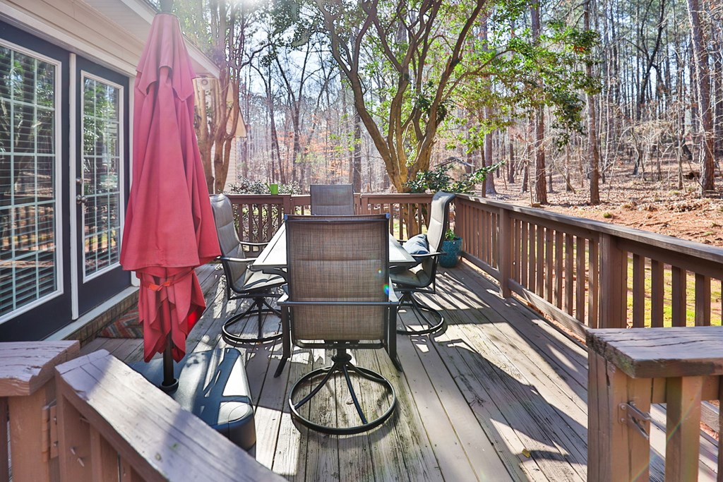 1236 Martin Road Hamilton, GA 31811 - Photo 24 of 33 a view of balcony with chairs and wooden fence