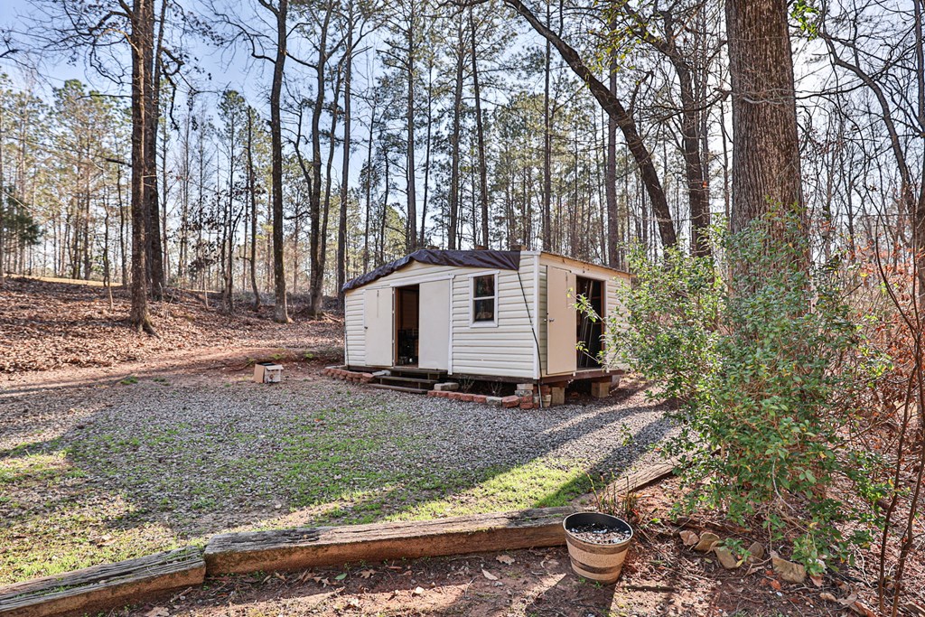 1236 Martin Road Hamilton, GA 31811 - Photo 26 of 33 a view of a house with backyard