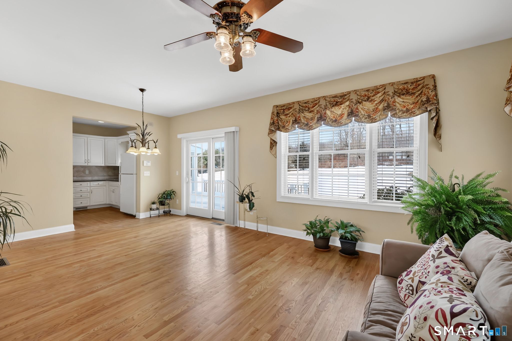 65 Trailside Drive Monroe, CT 06468 - Photo 16 of 39 a living room with furniture and a large window
