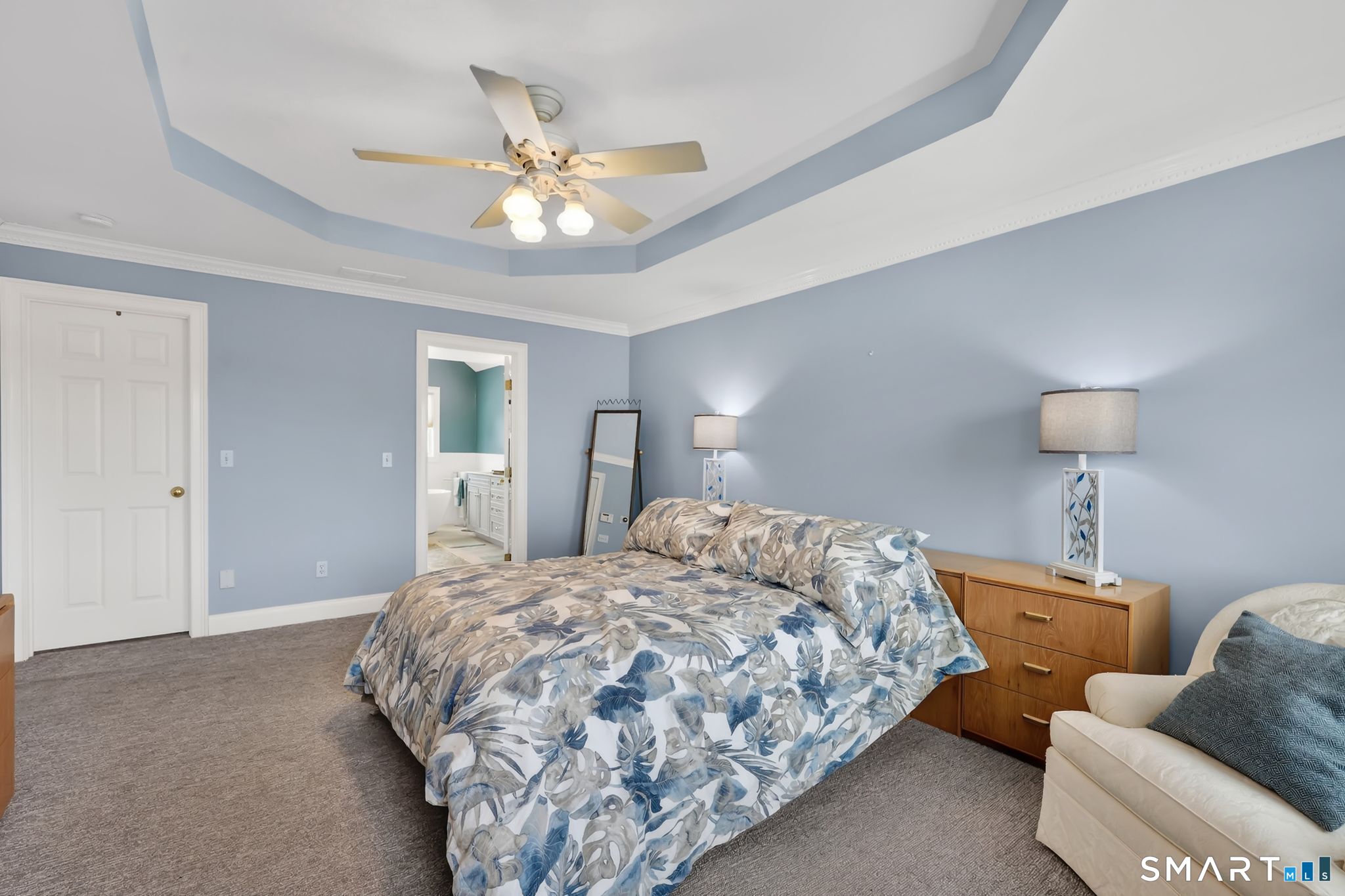 65 Trailside Drive Monroe, CT 06468 - Photo 21 of 39 a bedroom with bed and a chandelier
