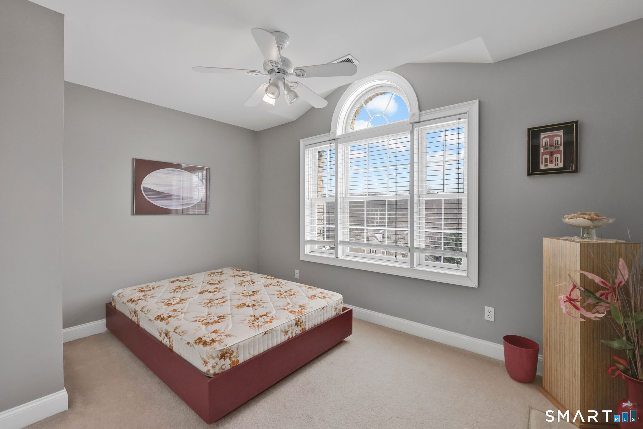 65 Trailside Drive Monroe, CT 06468 - Photo 26 of 39 a living room with a bed furniture and a window