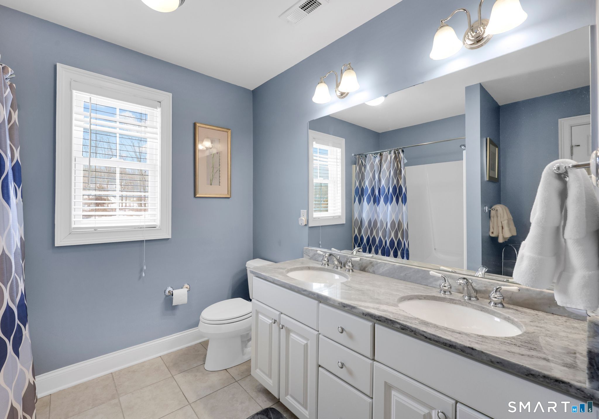 65 Trailside Drive Monroe, CT 06468 - Photo 28 of 39 a bathroom with a granite countertop double vanity sink a mirror and a toilet