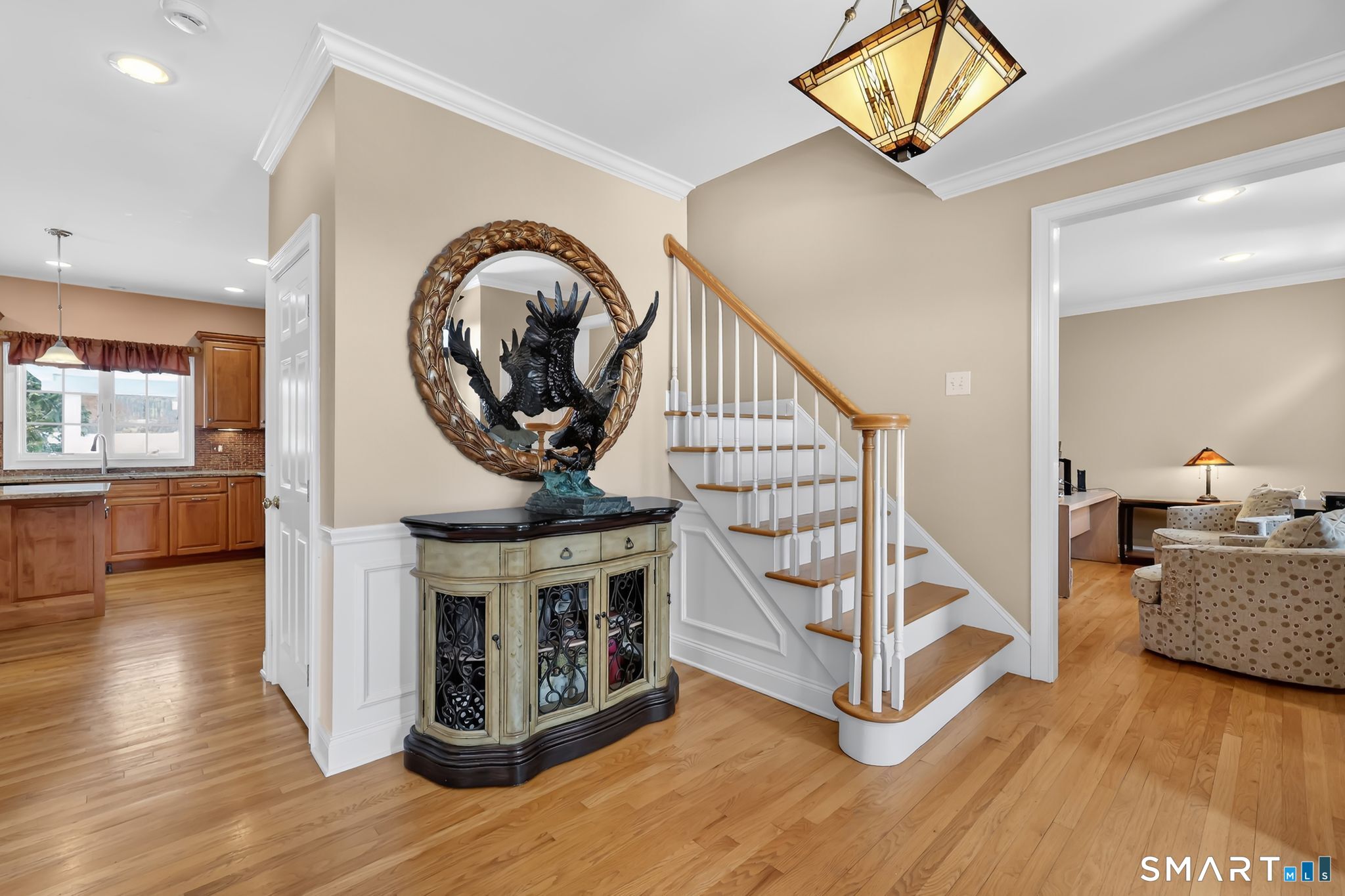 65 Trailside Drive Monroe, CT 06468 - Photo 4 of 39 a view of a livingroom with furniture wooden floor and windows
