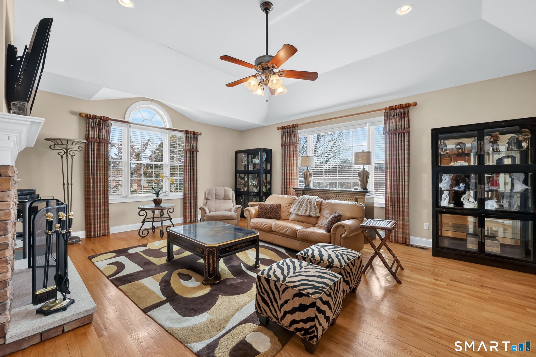 65 Trailside Drive Monroe, CT 06468 - Photo 9 of 39 a living room with furniture and a large window