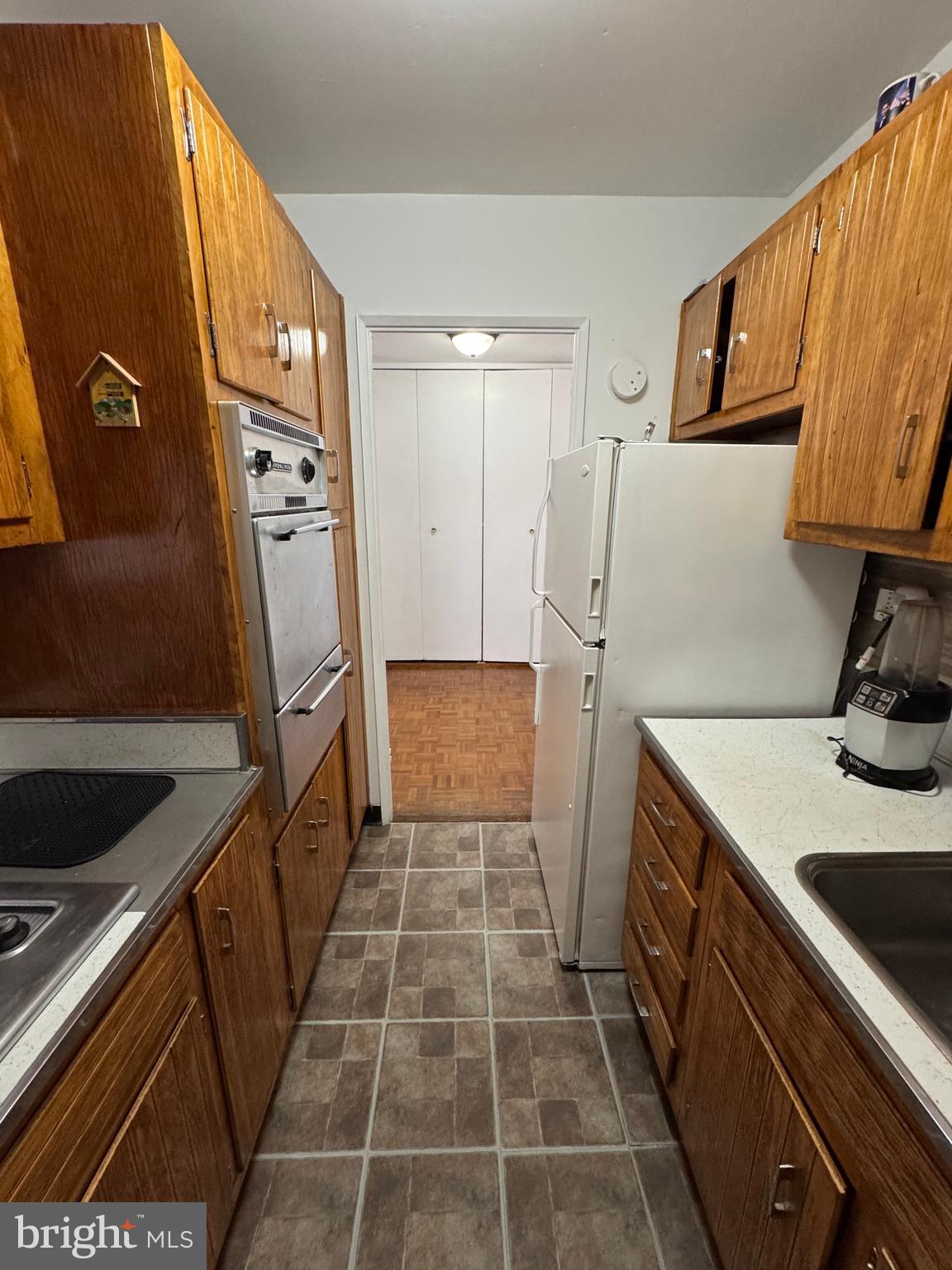 1517 Hill Road Reading, PA 19602 - Photo 4 of 12 a kitchen with a sink appliances and cabinets