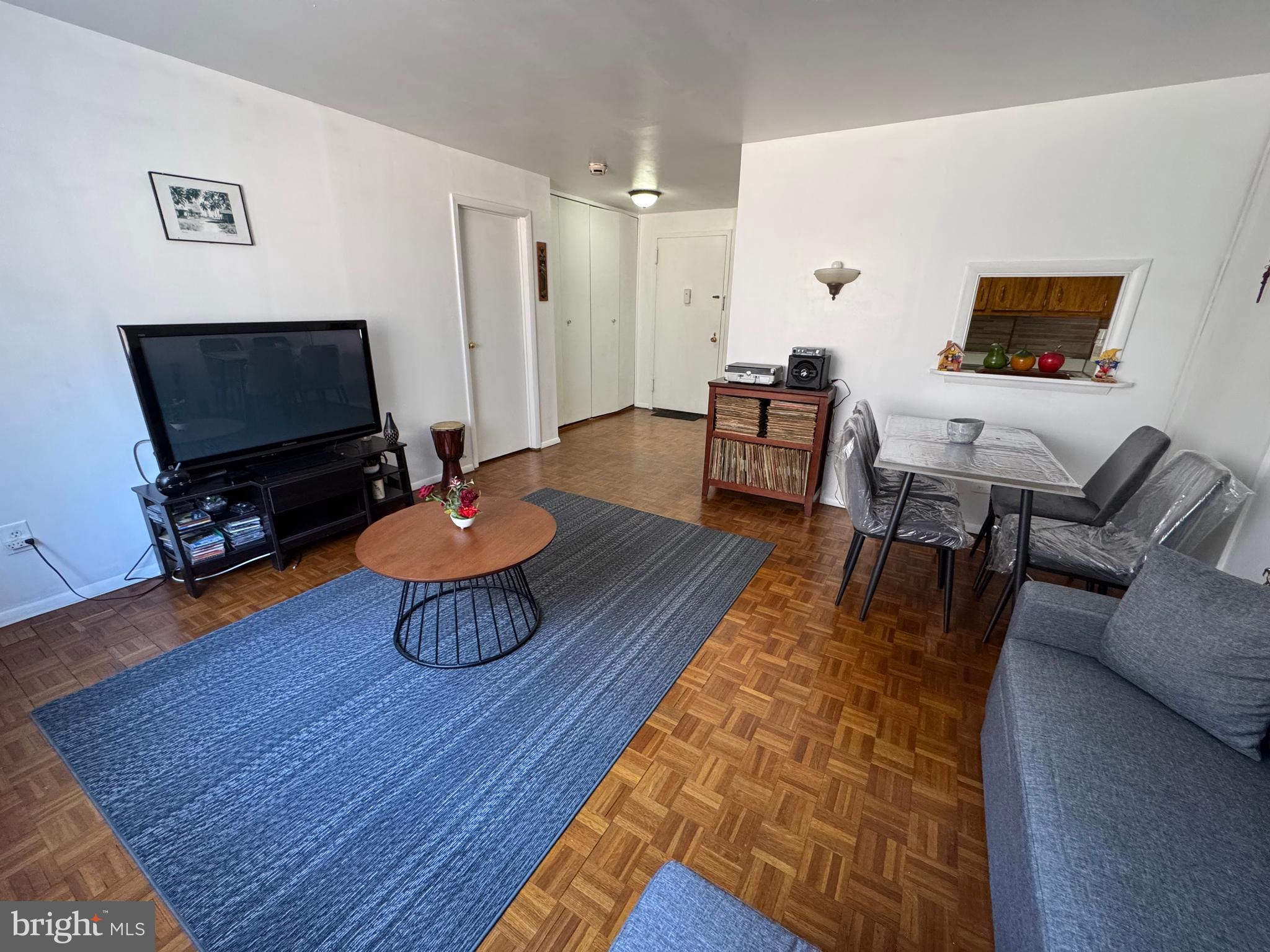 1517 Hill Road Reading, PA 19602 - Photo 7 of 12 a living room with furniture and a flat screen tv