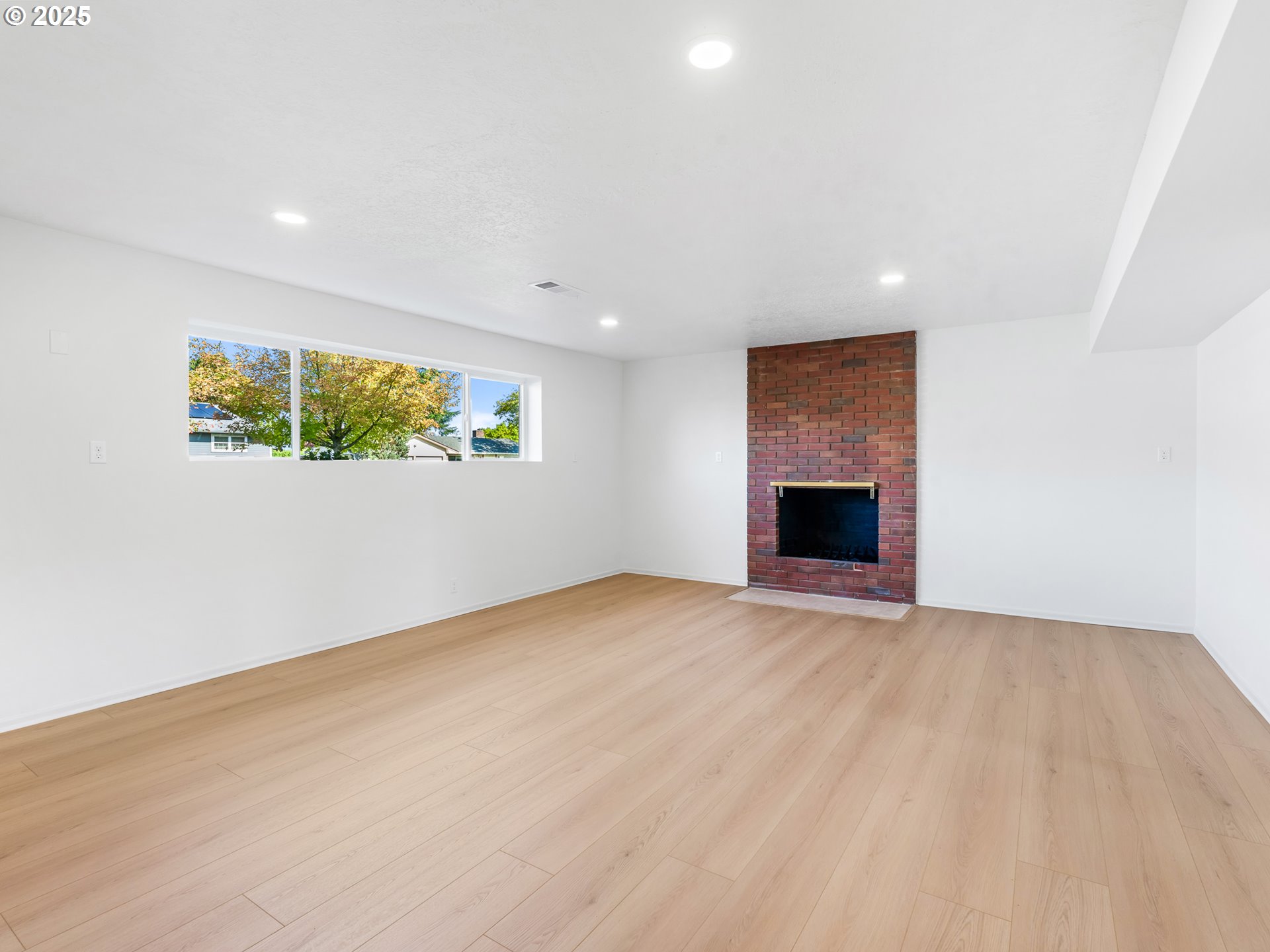 12942 Northeast Morris Street Portland, OR 97230 - Photo 17 of 28 an empty room with windows