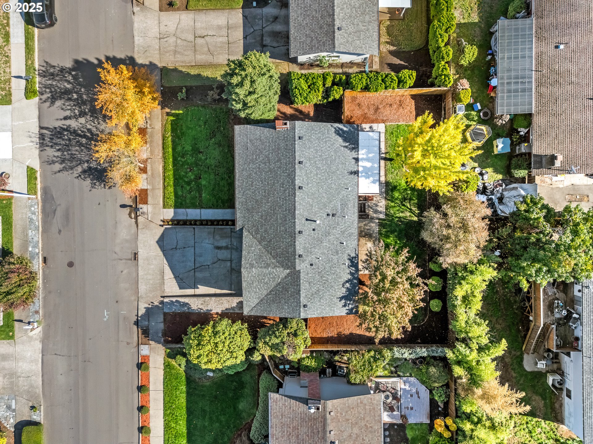 12942 Northeast Morris Street Portland, OR 97230 - Photo 27 of 28 an aerial view of a house with a yard and garden
