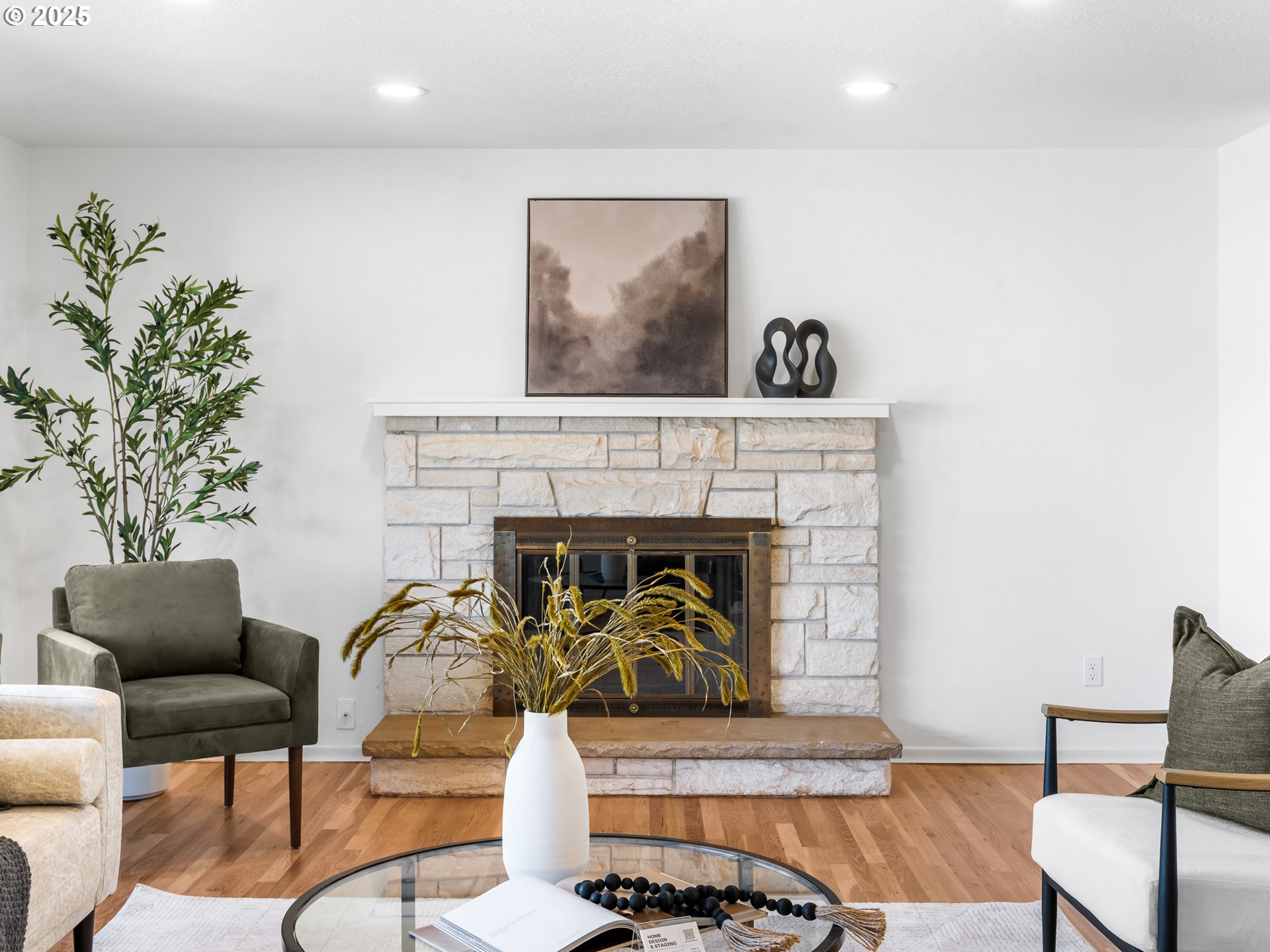 12942 Northeast Morris Street Portland, OR 97230 - Photo 5 of 28 a living room with furniture and a fireplace