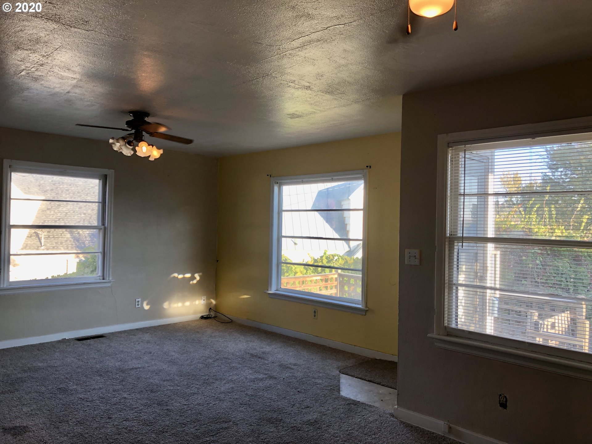 607 Southwest 10th Street Pendleton, OR 97801 - Photo 4 of 15 a view of an empty room with a window